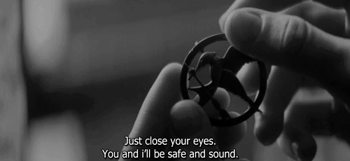 The Hunger Games (2012) Quote (About safe mockingjay pin gifs black and white)